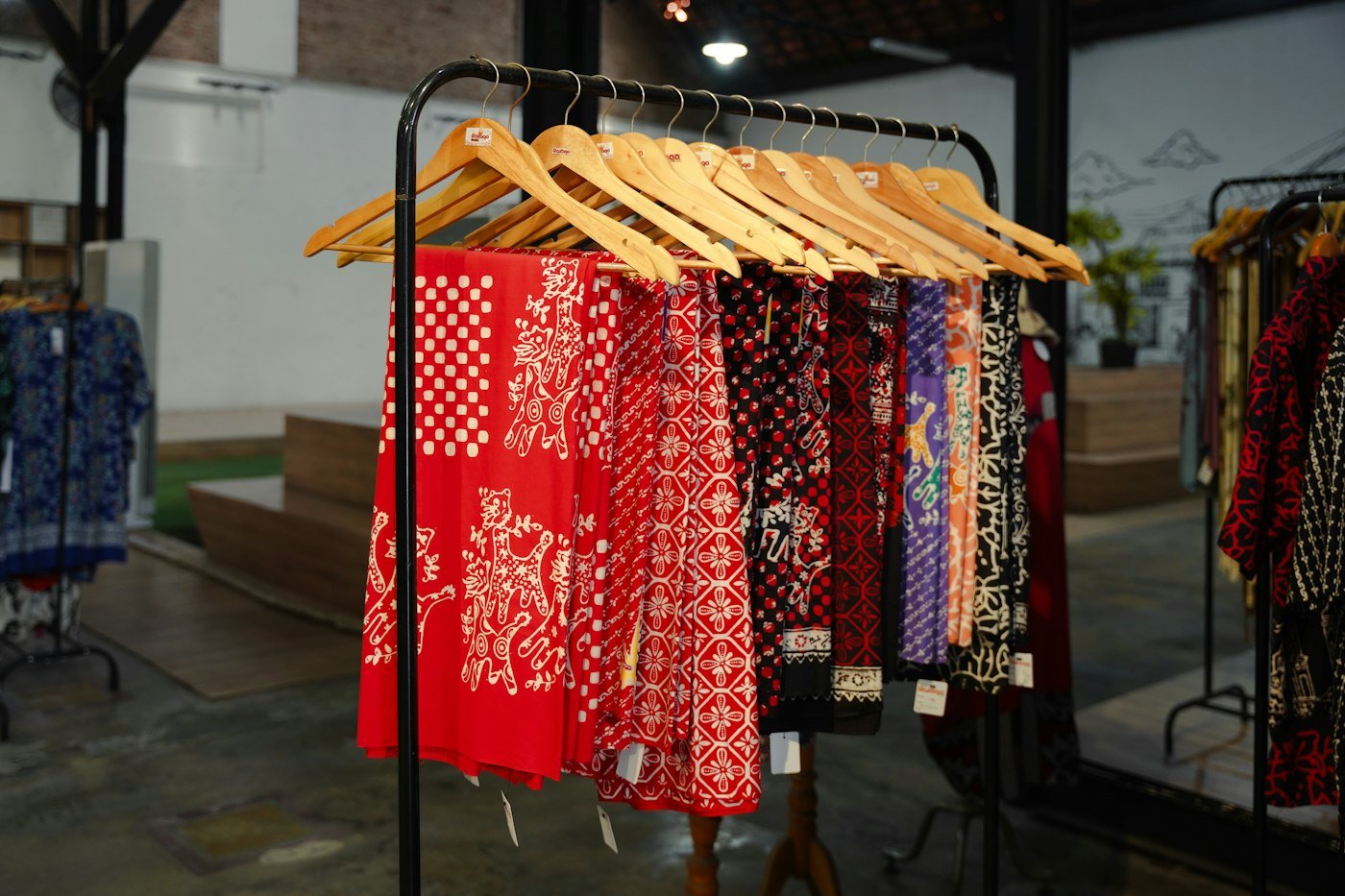 Patterned fabrics hanging on a rack