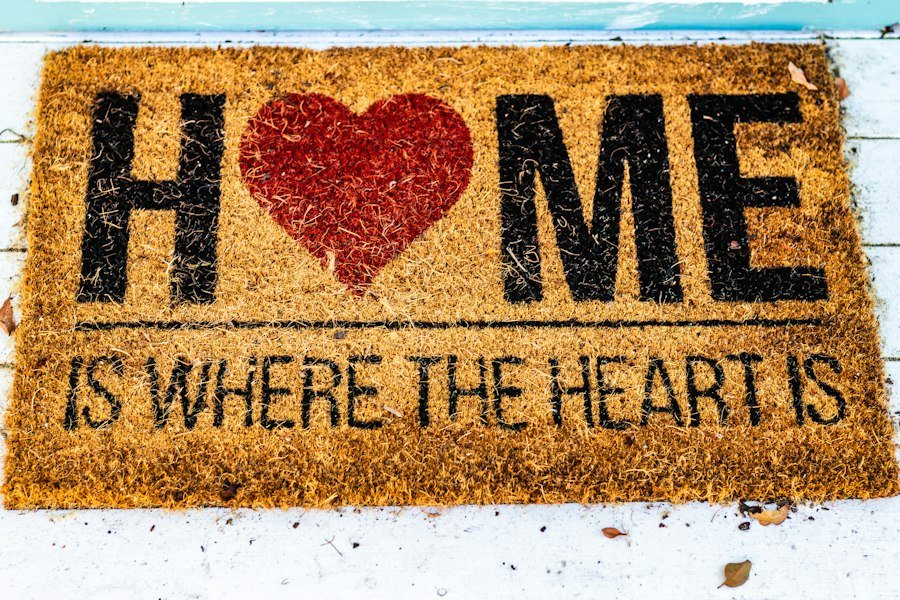 Brown and red door mat