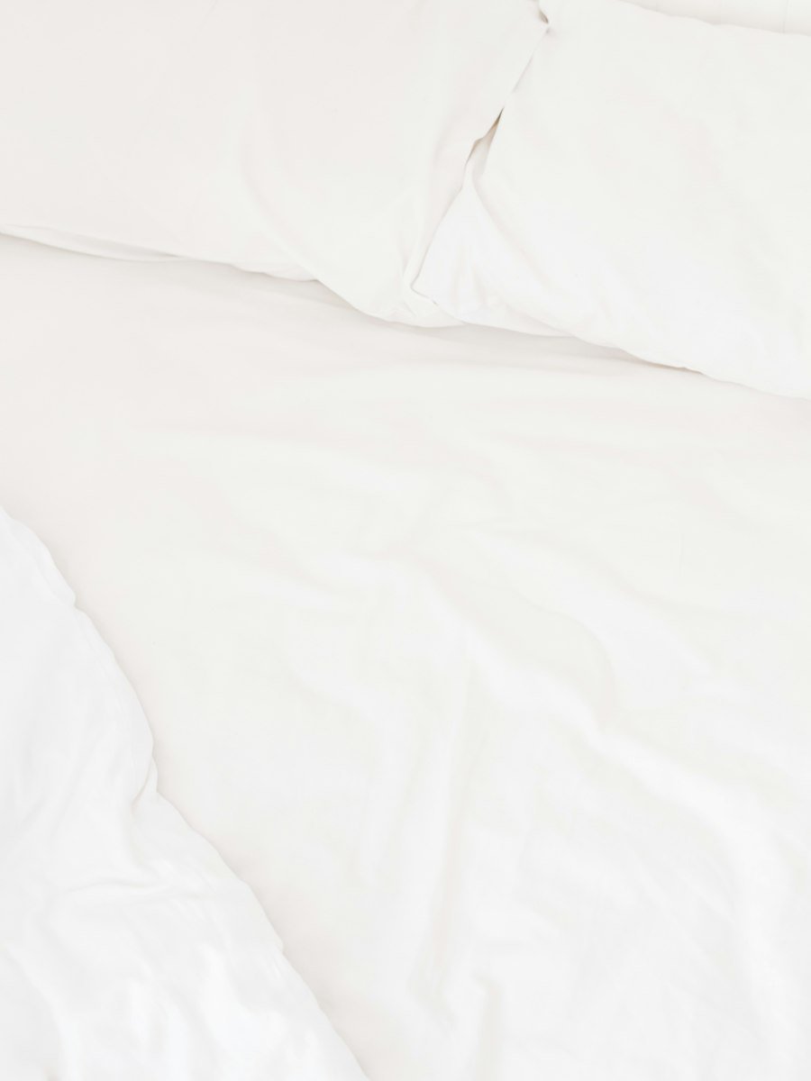 Bed with fresh white sheets