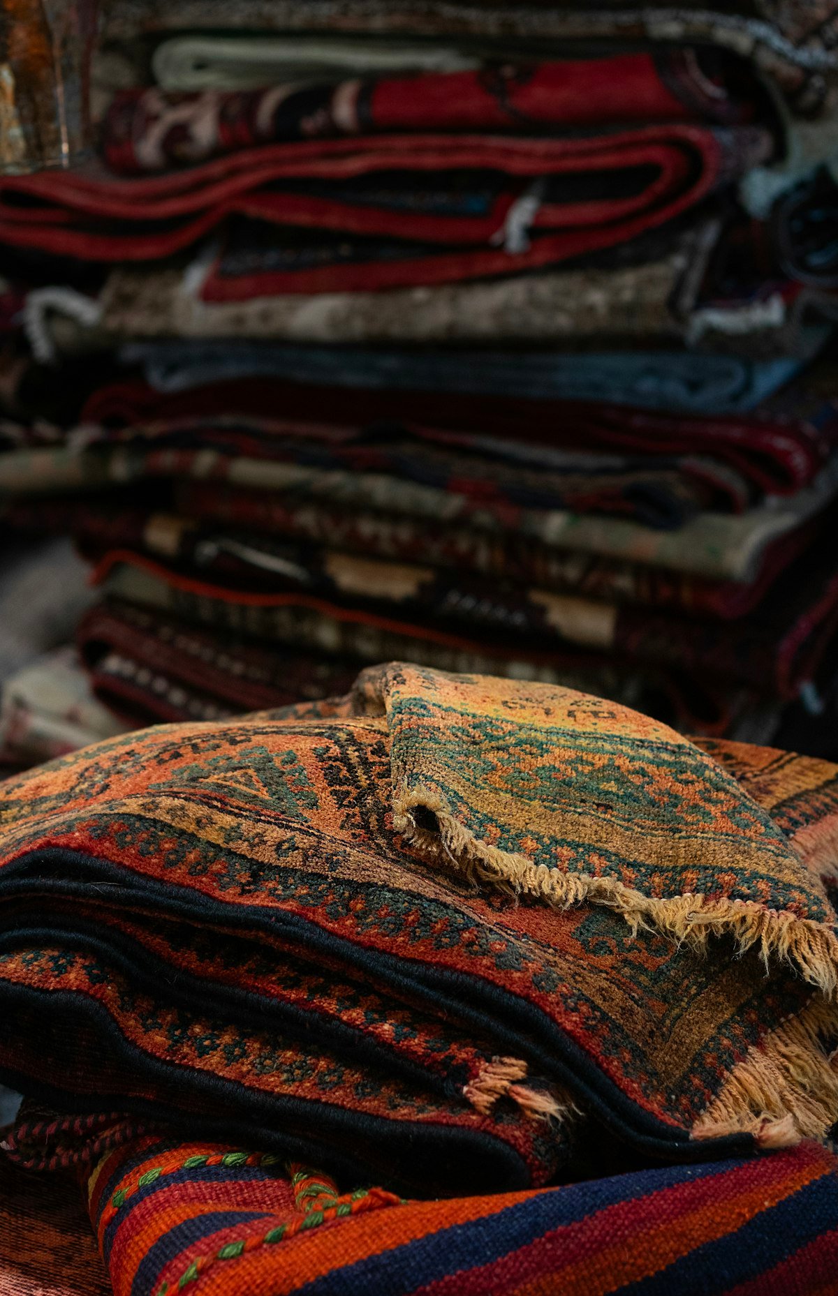 Pile of colourful rugs