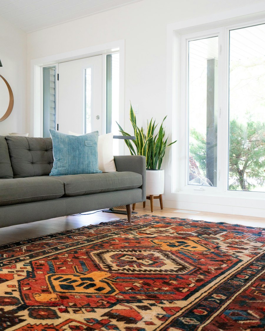 Sofa with cover and rug
