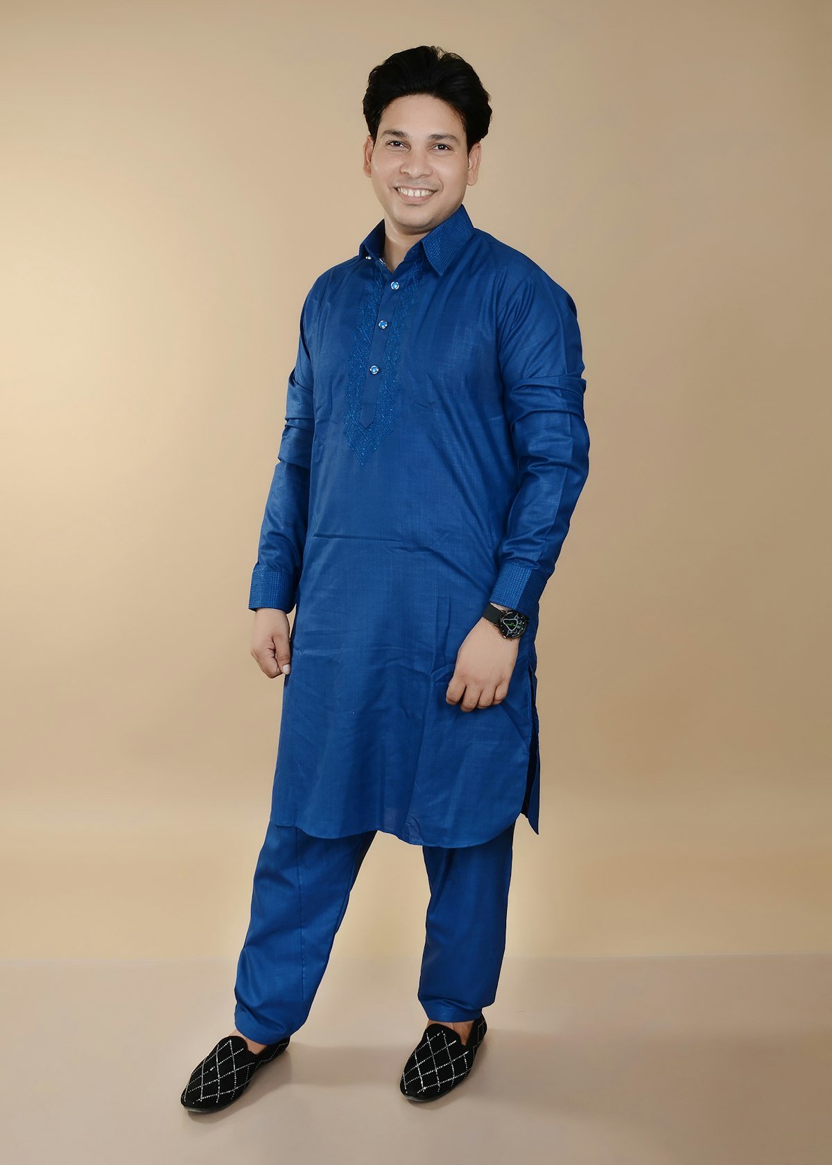 Man in a blue kurta