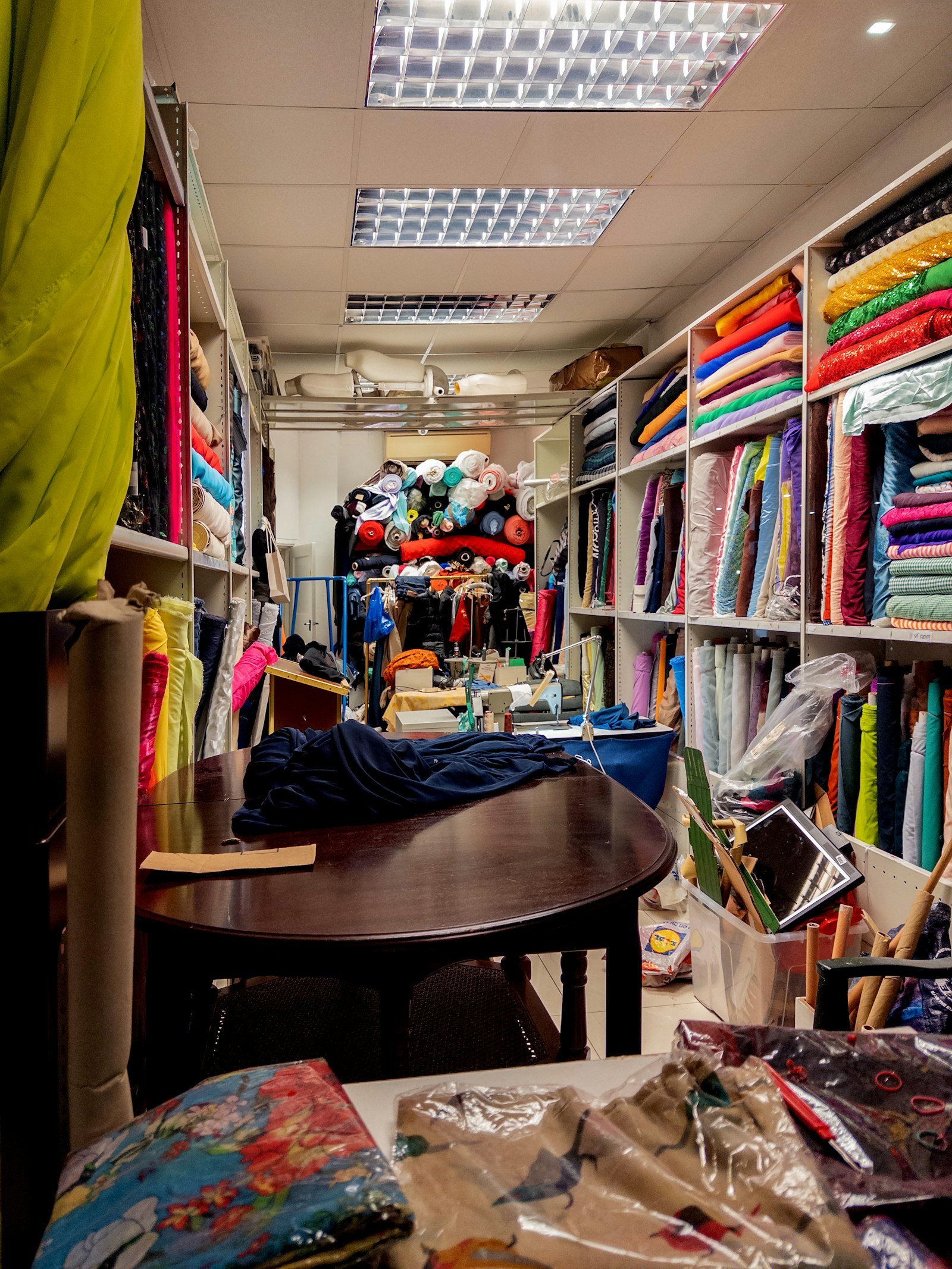 Fabric store with shelves full of textiles