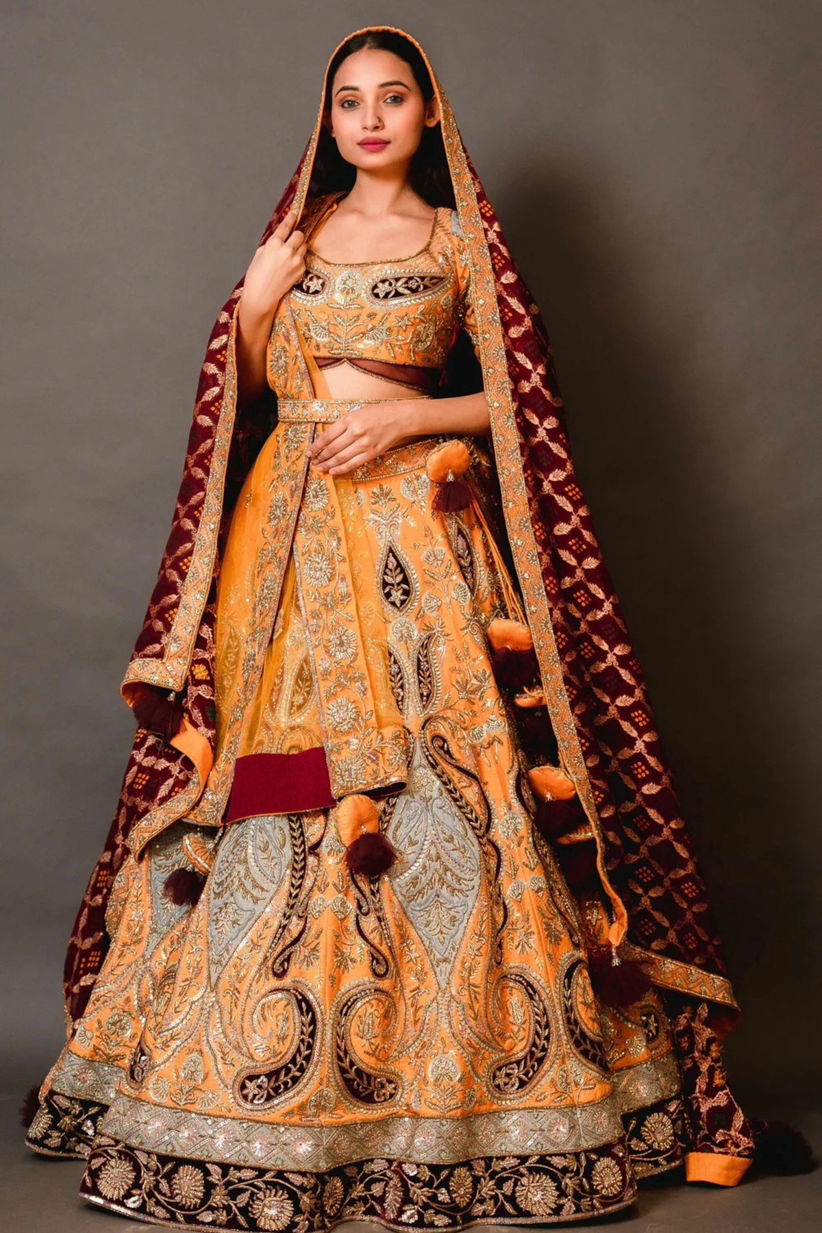 Yellow and maroon traditional attire