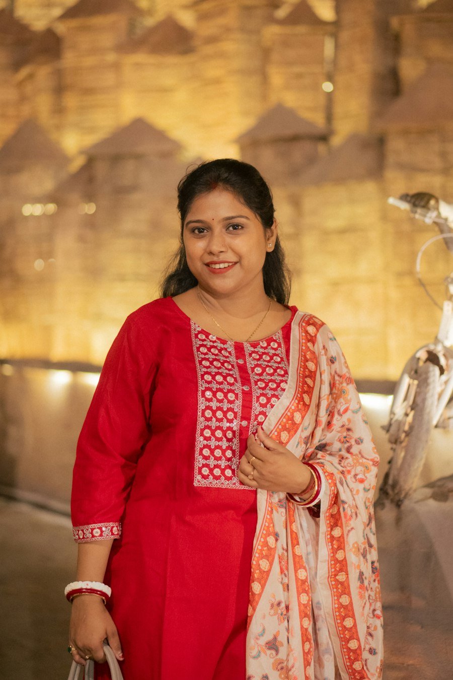 Red salwar suit with floral dupatta