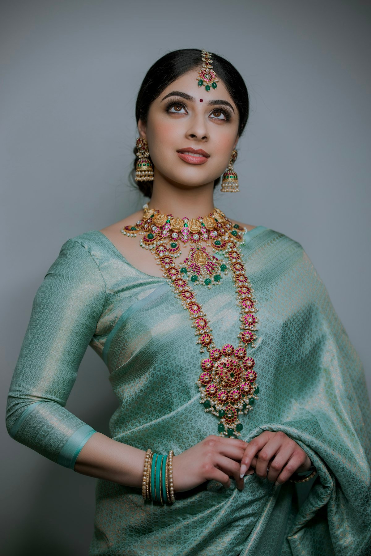 Woman in a green saree